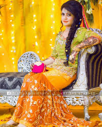 This Dress Is Wore By Brides From Pakistan And India Mostly On Their Mehndi Mayoon Dholki Haldi Ceremony Of Their Bride Photography Wedding Photoshoot Bride