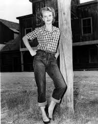 1950s Denim Jeans And A Western Shirt With Black Ballet Flats An Iconic 50s Look 1950s Fashion 1950 Fashion Vintage Fashion 1950s