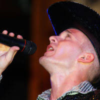 Members of the USAF, Tops in Blue, entertainment production "The Magic of  Music" perform at Andrews AFB, MD. Tops in Blue is an all active duty USAF  special unit made up of