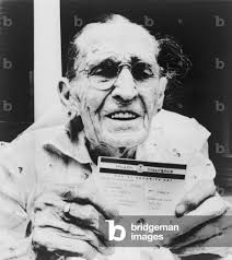 Image of Centenarian Frances Perry holds Medicare card