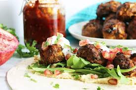 Serve with couscous or quinoa, to soak up the lovely juices, and a simple green salad. Baked Lamb Meatballs With Harissa And Feta Slow The Cook Down