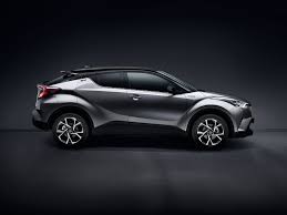 Black door handles and chin spoiler. New Toyota C Hr Coupe High Rider Hybrid Crossover Toyota C Hr Best Suv Toyota Hybrid