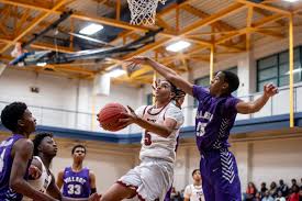 Josh Reid's last-minute layup gives Village dramatic win over Trinity