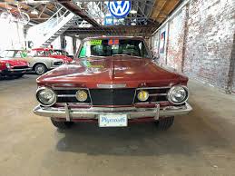 Image result for Medium Red 1965 Barracuda