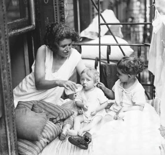 New York City family sleeps on fire escape in 1927