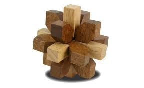 This is a very difficult and very large (7x7x7) wooden puzzle. True Genius Puzzle Collection Project Genius