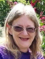Carolyn S Ford-Elmore, 56, of Iowa City, died is Oskaloosa, Thursday  December 12, 2013, from injuries received in an automobile wreck. She was  born October 22, 1957 in Washington to Duane "Tubby"