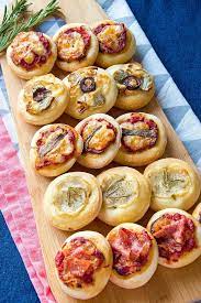 Pizzette Mini Pizza Bites With Assorted Toppings Assorted Bites Italianpizza Mini Pizza Pizzaideas P Pizza Bites Mini Pizza Recipes Mini Pizza Bites