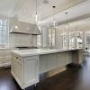 The amount of natural light in this room prevents the dark wood from leaving the kitchen feeling like a cave. 1