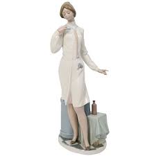 Graceful porcelain figure of a young nurse. Lladro Nurse Porcelain Figurine Sold At Auction On 8th September Bidsquare
