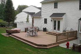 A composite deck is also better when the homeowners want to do little maintenance and they do not like the grey look of a. Ground Level Composite Deck Patio Deck Designs Decks Backyard Patio