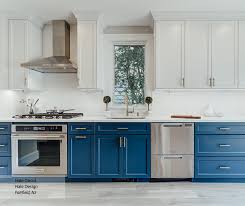 Maple is a strong competitor, though. Casual Blue And White Painted Maple Kitchen Cabinets Omega