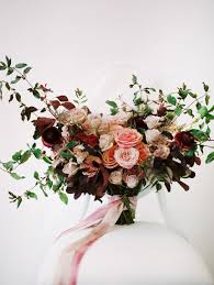 Wedding Bouquet With Cream Orange And Burgundy Tones Featuring Garden Roses Ranunculus And Honeysuckle Wedding Flowers Wedding Bouquets Wedding