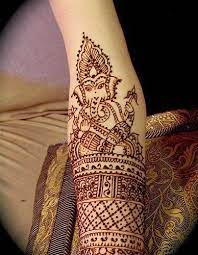 Colored lotus flower and ganesha tattoo. Ganesh Tattoo Ideas And Designs How To Tattoo Ganesh Tattoo Henna Tatowierung Tattoos