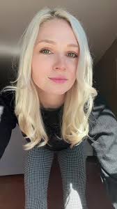 Dance Moves with Stylish Sneakers in a Cozy Living Room