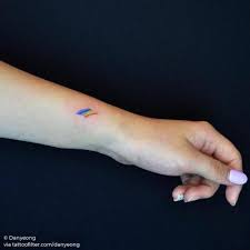 This is an unusual design for a dragonfly being a skeleton. Tattoo Tagged With Rainbow Flag Small Micro Tiny Activism Ifttt Little Wrist Minimalist Danyeong Other Inked App Com