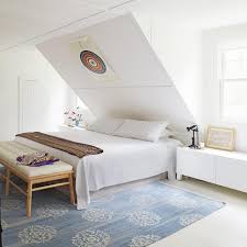 Bedroom under sloped ceiling is almost the most popular solution. Photos Hgtv