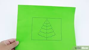 Plus when that card is a special pop up card, it is cherry on the cake. How To Make A Christmas Tree Pop Up Card Robert Sabuda Method