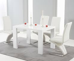 Gloss white round dining table and 4 white faux leather chrome dining room chairs with free uk delivery for £449. White Gloss Dining Table And 4 Chairs Off 52
