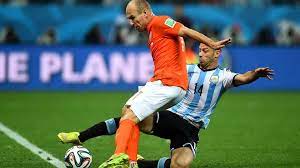 Would you like to know what dutch superstar arjen robben thinks about the penalty against mexico? Fifa World Cup Argentina S Javier Mascherano Makes A Tackle On Netherlands Forward Arjen Robben Facebook