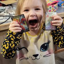 Even our daughter pulls better than me in Pokémon lol. It just warms our  heart to see her get so excited to open packs and even sleeve her own cards  to put