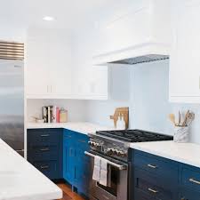 You can see that the rest of the colors in the kitchen are in the gray and white family (cooler colors) so the blue provides a great contrast. Best Two Toned Kitchen Cabinet Ideas