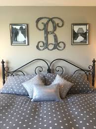 Idea For Above The Bed In Master Bedroom Monogram And Picture Frames Master Bedroom Wall Decor Decor Over Bed Bedroom Wall Decor Above Bed