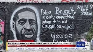 </p> <p> the paint was sprayed over floyd's eyes and face. George Floyd Mural Defaced On Pensacola S Graffiti Bridge Youtube