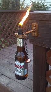 Make Unique Decorative Tiki Torches Out Of Glass Wine Beer Soda Olive Oil Bottles Special Wick Holder Beer Bottle Crafts Tiki Torches Wine Bottle Tiki Torch
