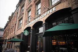 Stylecaster Best Zoom Backgrounds In 2020 Starbucks Locations Starbucks Background