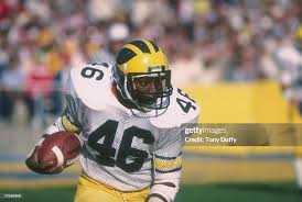 Lawrence Ricks of Michigan runs with the ball during their 24-14 loss...  News Photo