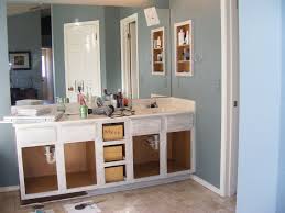 We have redone all 6 bathrooms and used white painted cabinets in all of them. Painting Bathroom Cabinets White Before And After Painting Inspired