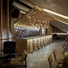 Lithuanian Studio Inblum Architects Has Inserted A Bar Into The Attic Of An Old House In Minsk Belarus Bar Design Restaurant Bar Interior Cafe Design