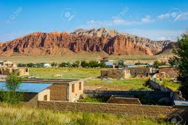 It lies in the heart of the fertile ferghana valley. Outskirts With Houses And Mountains Of Naryn City Kyrgyzstan Stock Photo Picture And Royalty Free Image Image 91384162