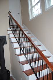 Interior railings on balcony and stair are often the architectural highlight of a room! Custom Iron Railings Wrought Iron Railings Mill City Iron