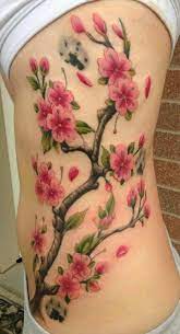 Cherry blossom tattoos with their natural floral pattern look beautiful and desirable. 150 Cherry Blossom Tattoos Meanings Ultimate Guide 2021