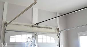 White adjustable metal overhead garage storage rack (45 in w x 45 in d) the hyloft 45 in. Overhead Garage Storage Shelf Her Tool Belt
