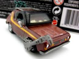His license plate is wrekd, short for wrecked. Dan The Pixar Fan Cars 2 Towga Gremlin