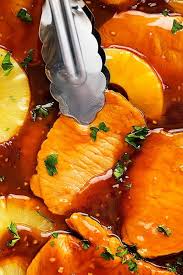 Who doesn't love a tender pork chop smothered in a tasty sauce? Slow Cooker Hawaiian Pork Chops Creme De La Crumb