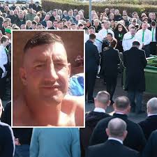 Heartbroken mourners line streets as 6ft 7 boxer Karl Moloney's huge coffin  carried through Thorntree