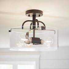 The flush mount lamp is three main parts. 3 Light Bronze Semi Flush Mount With Clear Glass Shade Semi Flush Mount Lighting Glass Shades Industrial Flush Mount Lighting