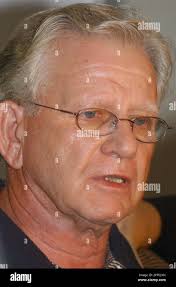 Bobby Coates, father of Allen Dwayne Coates, 37, of Irvington, Ky., speaks  to the press following his son's arraignment before Jefferson County  District Judge William Ryan, Thursday, July 17, 2003, in Louisville,