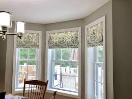 Professionals can create curtains, blinds or any other window treatment you desire that properly fit your exact dimensions. Mock Roman Shades In Bay Window Valance Window Treatments Inside Mount Window Treatments Faux Roman Shades