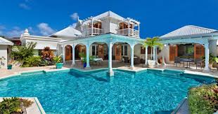 Rock Ridge Is A Spacious Villa Which Opens To A Beautiful Free Form Swimming Pool This Two Storey Vil Villas In Barbados Barbados Rentals Luxury Villa Rentals