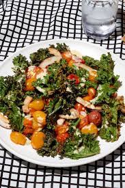 Warm Kale Coconut And Tomato Salad Recipe Tomato Salad Recipes Recipes Salad Recipes