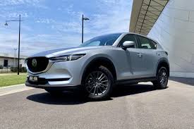 Switch the ignition off and close all of the doors and the liftgate. 2021 Mazda Cx 5 Maxx Sport Fwd Review Carexpert