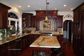 Using enamel paint brightens up the kitchen, and is especially useful as a backsplash coating. Tuscan Kitchen Backsplash With Cherry Cabinets And Rare Granite Traditional Kitchen Denver By Linda Paul Studio Houzz