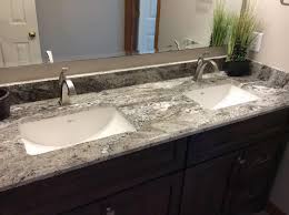 With black granite already in place in the room, this opens the door to using a black and white color scheme in the space. Granite Bathroom Countertops 5 Reasons To Add Luxury To Your Home Rsk Marble Granite