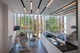 Bati Orthodontic Dental Polyclinic Slasharchitects Clinic Interior Design Dental Office Design Dental Design Interior