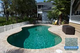 Crystalstones Natural Turquoise Pearl Creates A One Of A Kind Water Color In This Marsh Front Pool In Neptune Beach Pool Colors Blue Haven Pools Pool Plaster